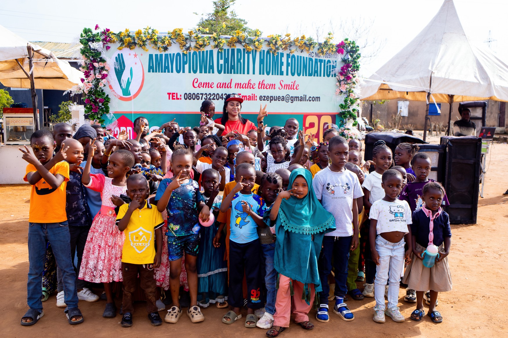 Children and caregivers at Amyopiowa